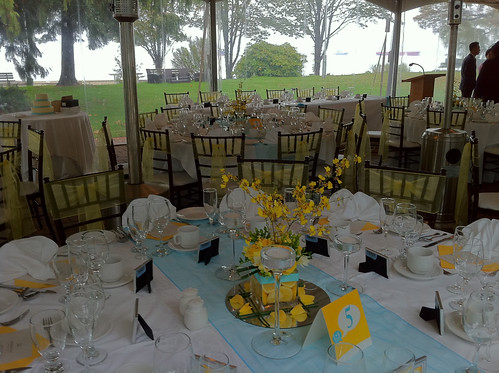 This fresh arrangement included fresh lemons yellow roses and tiffany blue