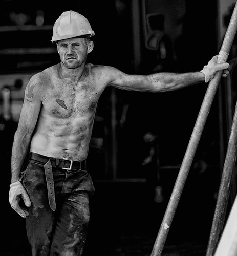 Construction Worker I am reposting this old picture since it has now become the icon of a new group on Flickr:  <a href="http://www.flickr.com/groups/the_21st_century_in_bw/">The 21st Century in B&amp;W</a>.  Group Admins are <a href="http://www.flickr.com/photos/simeon_barkas/">Akbar Simonse</a>, <a href="http://www.flickr.com/photos/jfrenzelphotos/">Phrenzel</a> and myself.  This group is about telling a visual history of people in the 21st century. Its looking specifically for the small stories that dont end up in the official history books, but illustrate the history of daily life. Only high quality B&amp;W will be accepted. Feel free to  <a href="http://www.flickr.com/groups/the_21st_century_in_bw/">visit</a>, post and/or become a member.