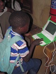 Student using XO OLPC laptop by Lubuto Library Project