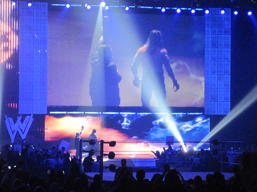 Undertaker and Paul Bearer leave the arena