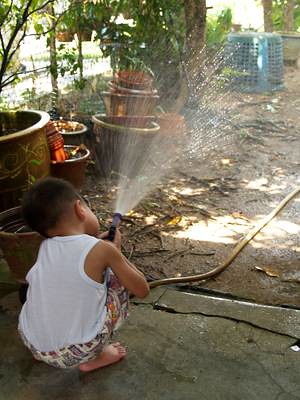 Julian spraying water