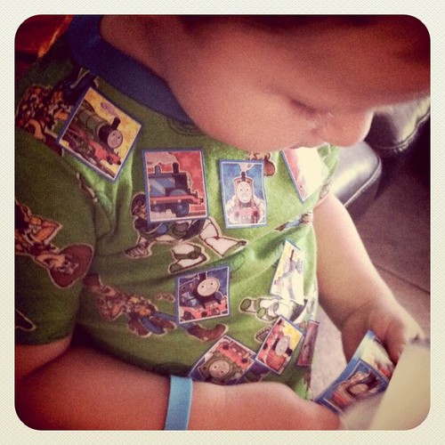 Covering himself in Thomas stickers... Choo Choo!