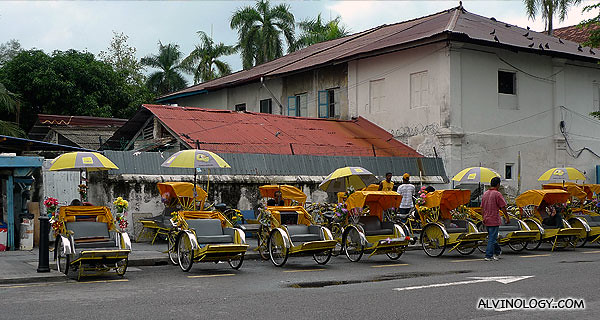 Row of trishaws outside Hotel Malaysia