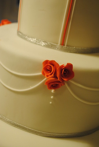Scarlet rose wedding cake with silver and white