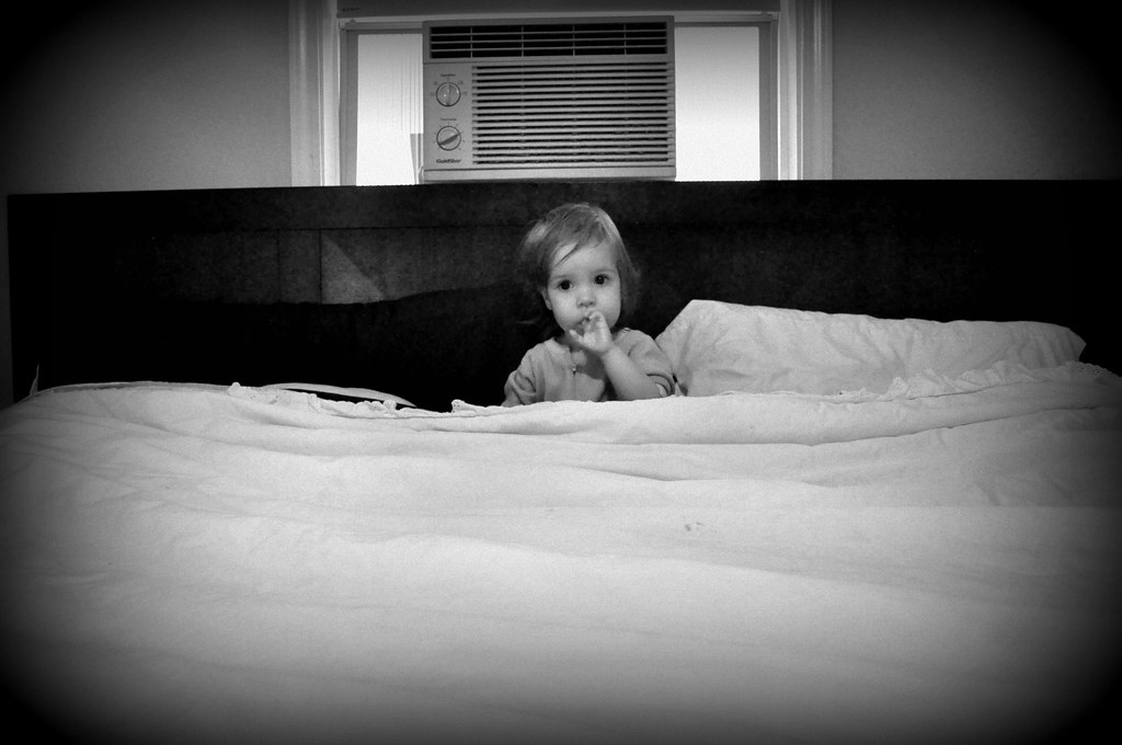Little Girl in a Big Bed