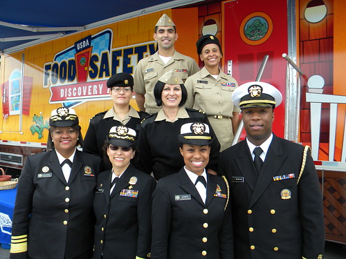 The Food Safety Discovery Zone’s hardworking staff of U.S. Public Health Service Commissioned Corps Officers take a break to pose with Surgeon General Regina Benjamin outside of the exhibit.The Food Safety Discovery Zone’s hardworking staff of U.S. Public Health Service Commissioned Corps Officers take a break to pose with Surgeon General Regina Benjamin outside of the exhibit.