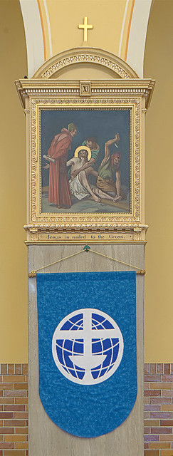 Saint Anthony Roman Catholic Church, in Lemay, Missouri, USA - station of the cross and banner