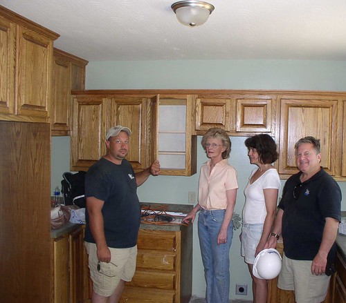 Jeromy Smith, Smith Woodworking, shows off his beautiful kitchen cabinetry to USDA Marietta Area Director Carol Costanzo, Barbara Conover, CEO of Three Rivers, and Tony Logan, Rural Development State Director.