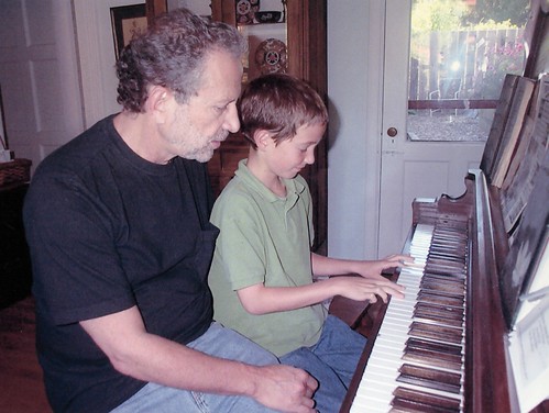 dad and collie at piano