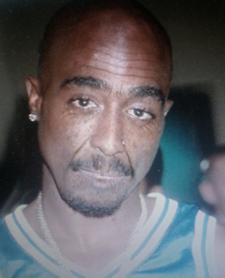 2pac dead photos. Tupac Shakur died on the 13th