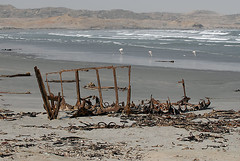 Shipwreck and flamingoes, Luderitz, Namibia