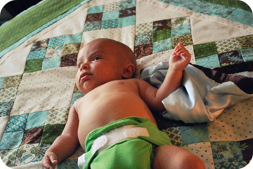 brody on his birthparents' quilt