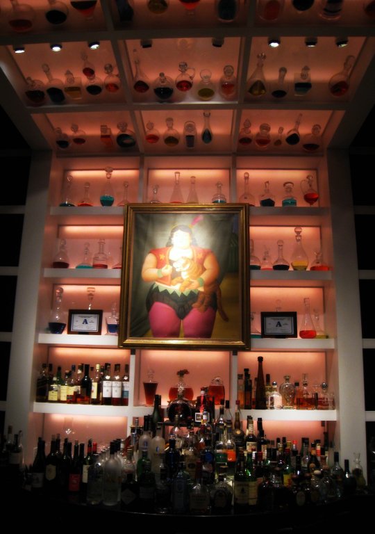 Fernando Botero circus painting above bar at Botero Restaurant in Vegas