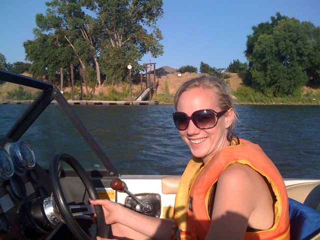 Monica driving the ski boat