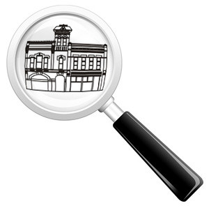 Black lineart of the Old Firehouse Books Logo (a firehouse with tower, many windows, and an arched doorway), set inside a magnifying glass (white circle with a black handle pointing to the bottom right). 