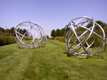 Coiled metal sculptures on the lawn of the Mall in Cleveland