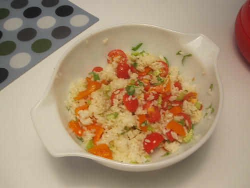Rice salad with tomatoes, bell pepper and basil