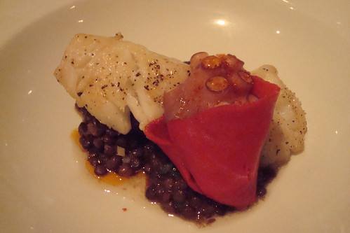 Cod with lentils, blood sausage, and octopus wrapped in pimenton