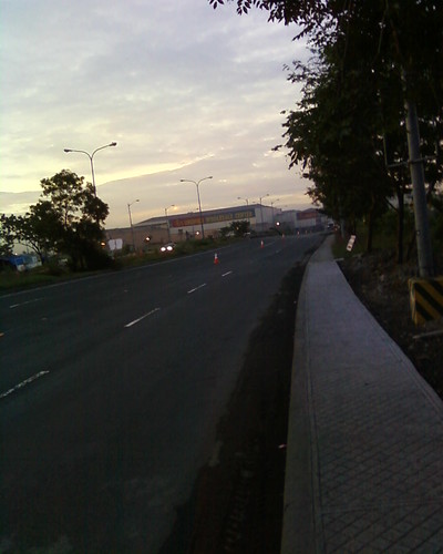 Cones lined along Macapgal Avenue ...
