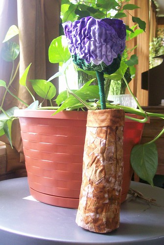 Log cabin flower in vase