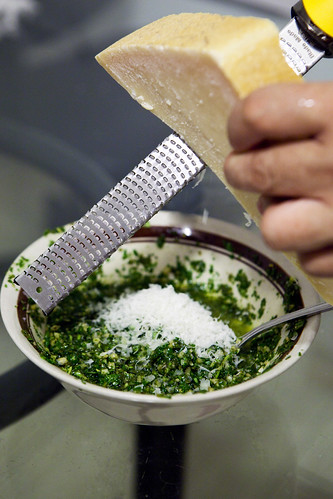 Grating Grana Padano into homemade pesto