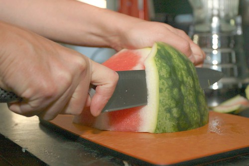 peeling fresh watermelon