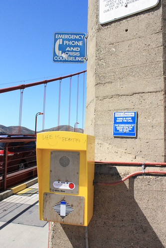 There are emergency crisis phones all along the bridge. 