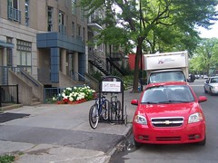 There are so many bicyclists in Montreal that there are public bike racks installed in neighborhoods