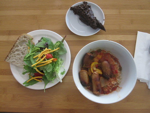 Sausages with peppers and rice, salad, bread, sacher torte from the bistro $6