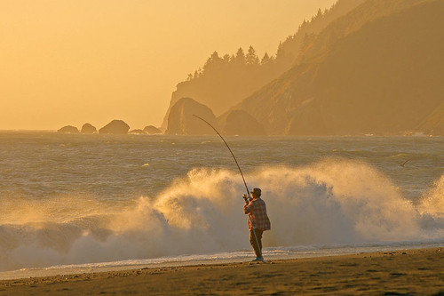 Fisherman on a Northern California coast. At sunset.