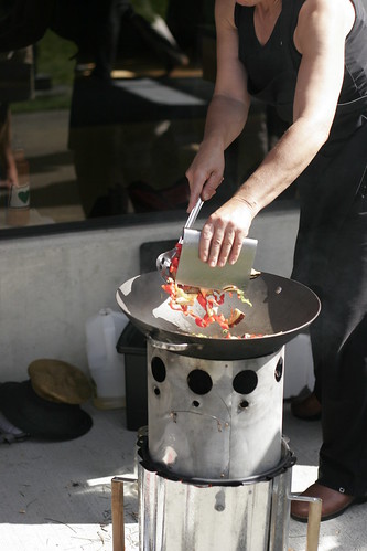 An example of a wok being used on a BioChar stove for stir-fry veggies