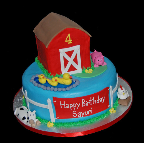 3D barn cake for a 4th birthday farm animal celebration