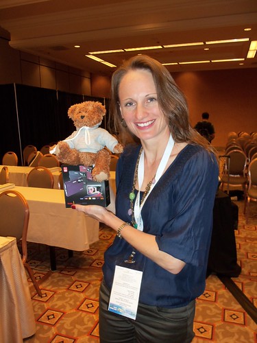 Andrea wins a Kodak M590 Camera and poses with EvaBear!