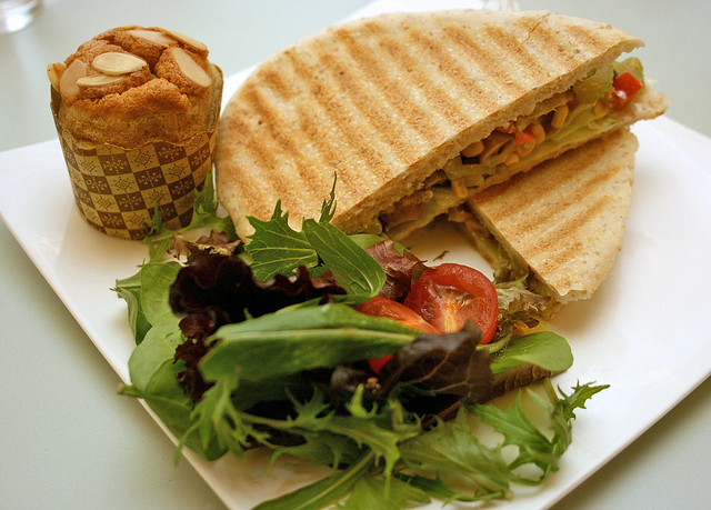 Crisp wholemeal panini with vegetables and sauteed mushrooms. Top left: wholewheat olive oil orange cake