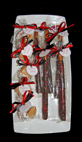 Red and Black Chocolate Dipped Pretzel and Fortune cookie favors for a ladybug party