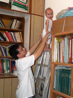 Justin climbs up a ladder
