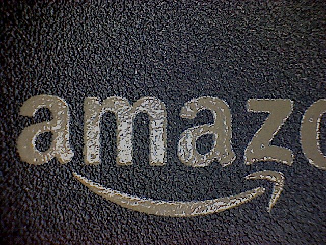 Amazon logo atop the Kindle 3. I took this series of shots of the Kindle 3 