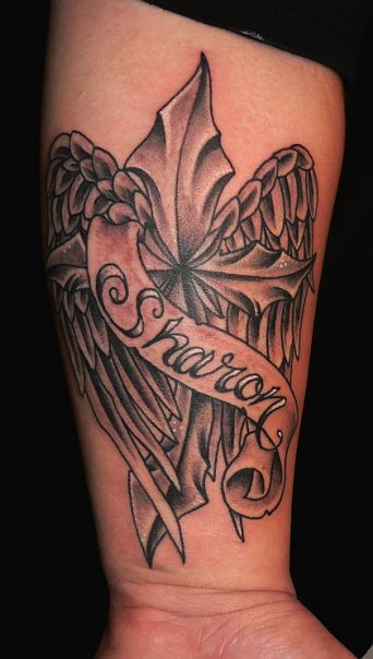 Winged Cross Tattoo. Tattoo by Eric Scsavnicki. Southside Tattoo & Piercing