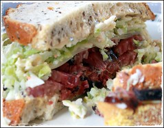 Pastrami sandwich with coleslaw on the inside.