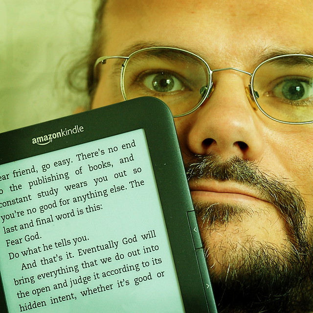 Wulf posing with his new Amazon Kindle. The text on the screen is a quote from Ecclesiastes 12:12