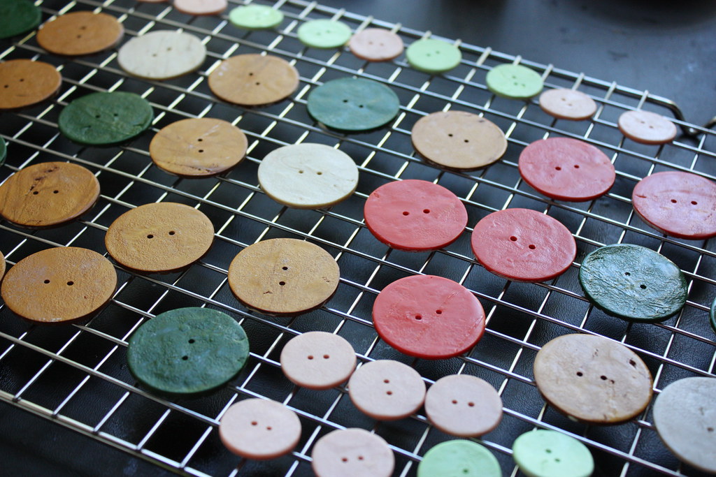 Last batch of buttons being glazed