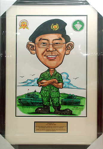 Caricature for SIngapore Armed Forces with gold metal plate engraving in frame