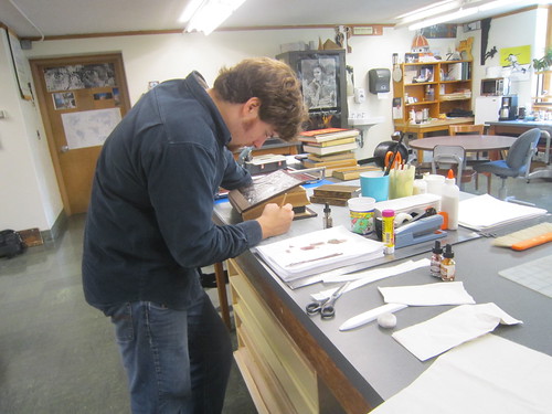 Josh working on book repair