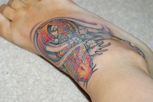 My new tattoo of a koi fish, done by Simon Hook in Leeds.. click here for 