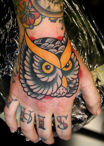 traditional owl tattoo. owl tattoo on hand
