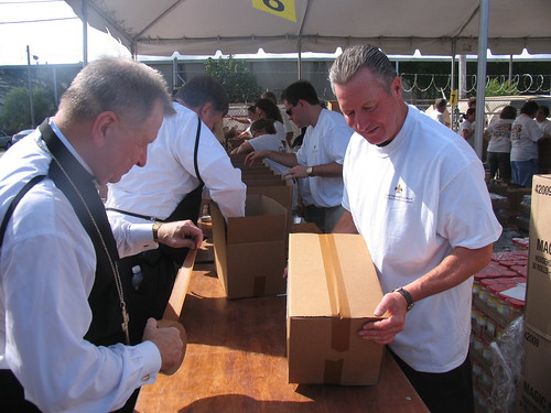Southwest Region RA Ludwig and Archbishop Gregory Michael Aymond volunteered to assemble emergency food boxes at the Second Harvest Food Bank of Greater New Orleans and Acadiana