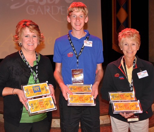 Lori, William and Pat Koch hold the park's 2010 Golden Ticket Awards.