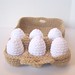 Half dozen crocheted eggs