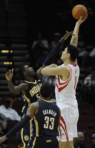 October 9th, 2010 - Yao Ming shoots over Indiana Pacer Roy Hibbert.  Yao scored 10 points in 12 minutes of action