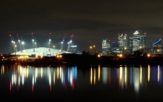 Canary Wharf skyline at night, London, UK   reflection